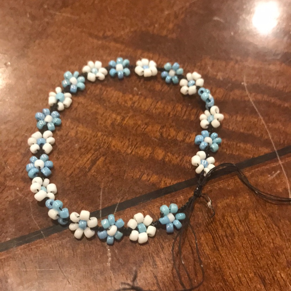 Blue and white flower draw string bracelet